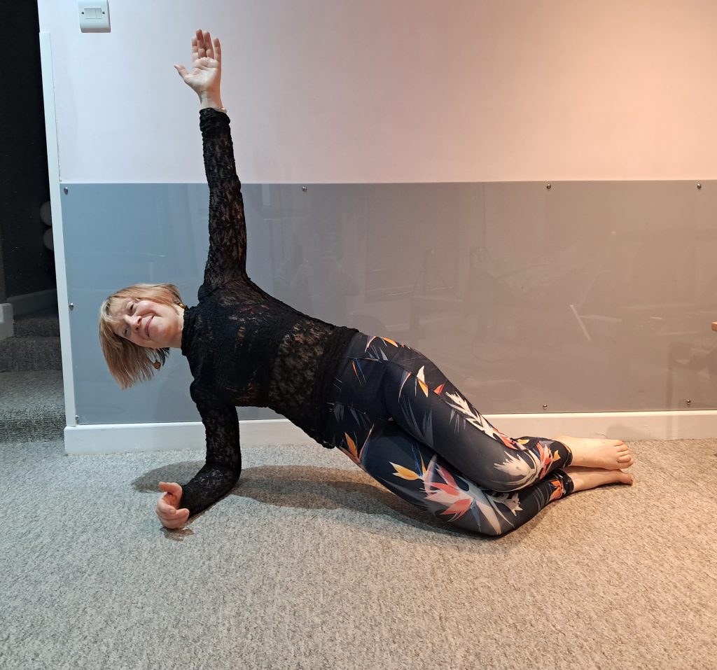 Author doing a modified side plank