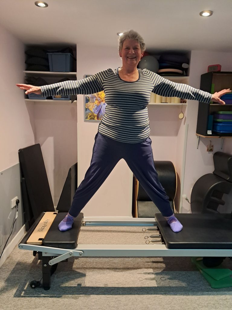 One of my clients doing Skating on the Reformer
